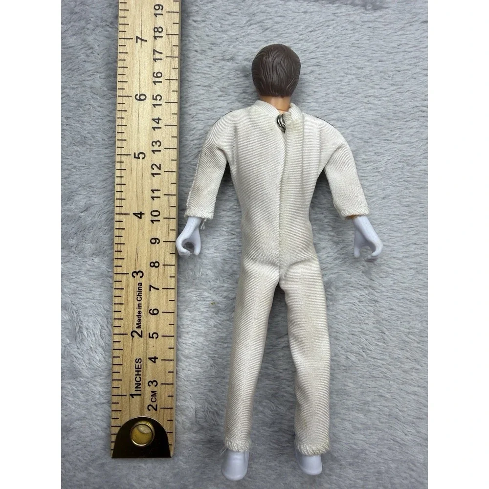 Vintage 7 in Action Figure White Jumpsuit Red/Blue V Star Chest Design
